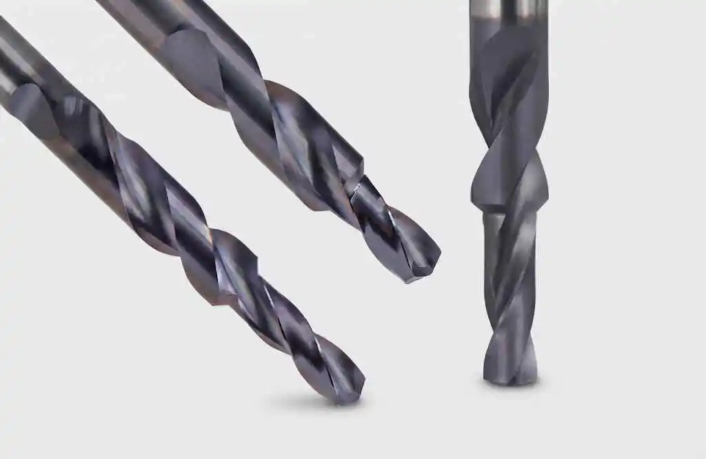 Solid carbide step drill for stepped and chamfered holes